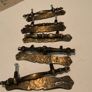 A lot of 5 handle vintage handle pulls for your restoration project. Used
